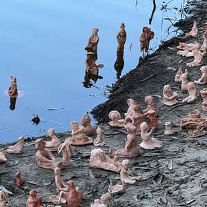Mandean artist Yuhana Nashmi’s installation of clay figurines; Baptism in fresh water is an important rite for Mandeans