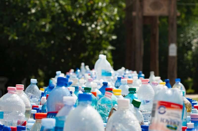 A group of plastic bottles collected to be returned for money as part of the Container Deposit Scheme in NSW otherwise known as Return and Earn.