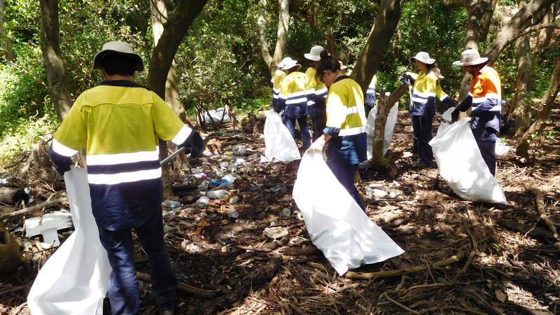 Corrective Services teams removing rubbish from the catchment