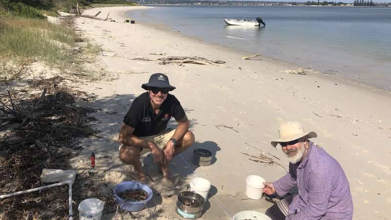 Scott Wilson from Macquarie University and David Reid from Georges Riverkeeper sampling microplastics at Towra Point